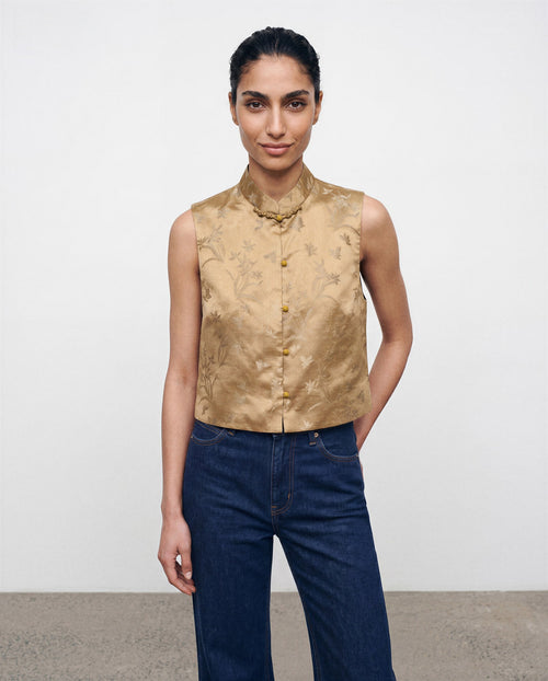 The Nhonha Vest, front view in gold floral silk with mandarin collar