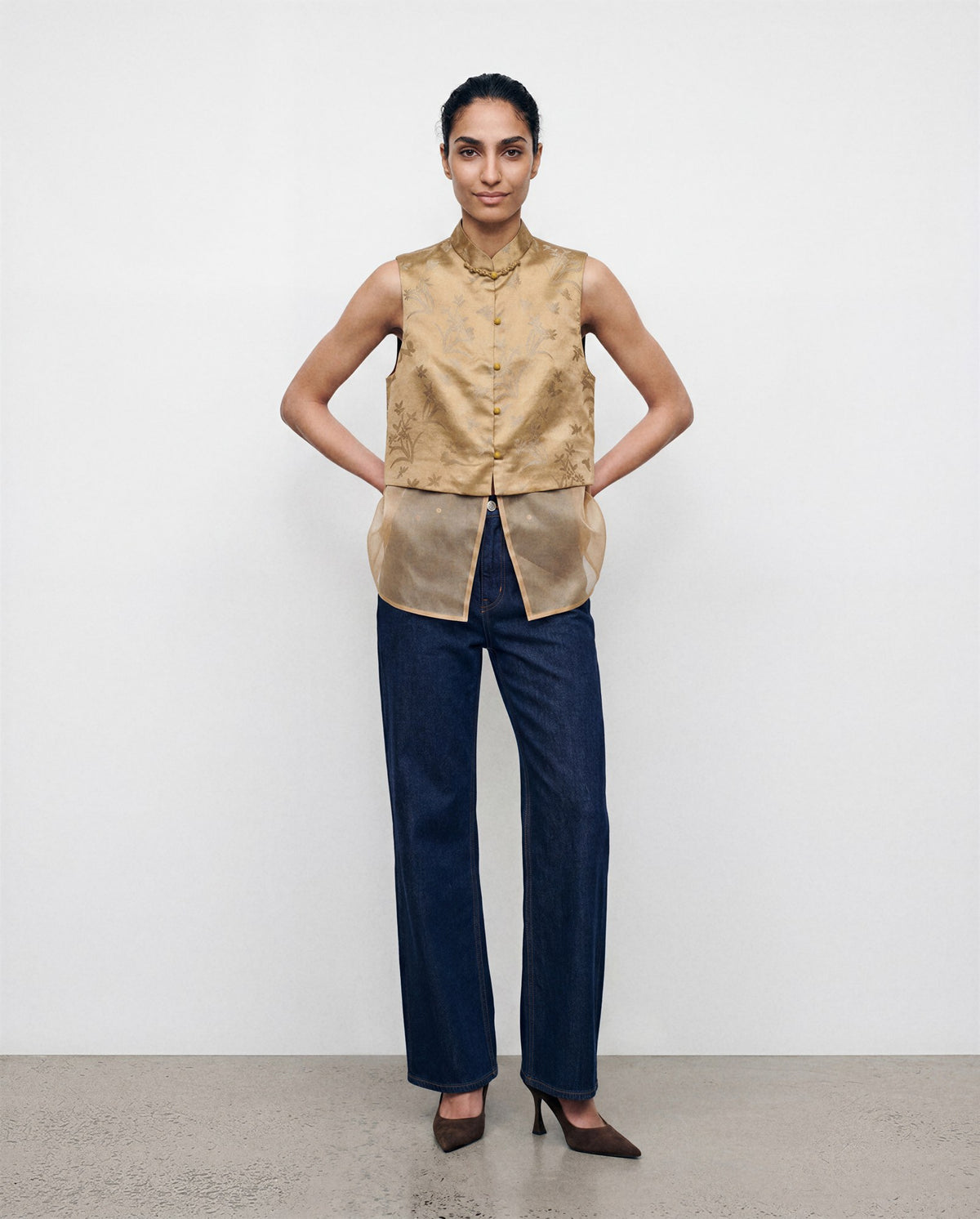 The Nhonha Vest, full-length view with detachable sheer layer