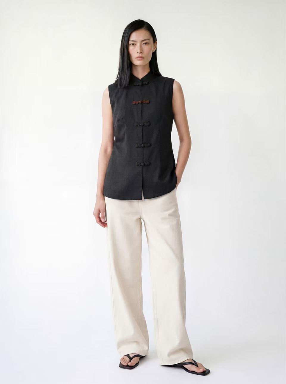 The Echo Reversible Vest, full-length view of the black side